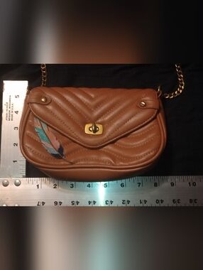 Quilted Saddle Crossbody Bag in Cognac Brown